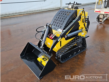 Мини-погрузчик с бортовым поворотом