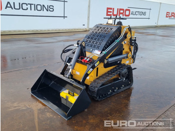 Мини-погрузчик с бортовым поворотом