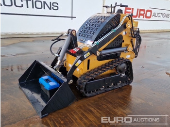 Мини-погрузчик с бортовым поворотом