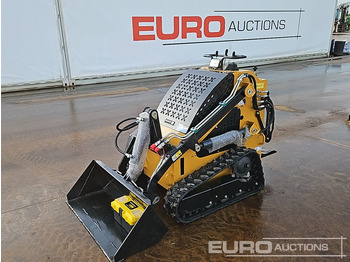 Мини-погрузчик с бортовым поворотом