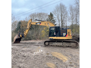 Гусеничный экскаватор CATERPILLAR