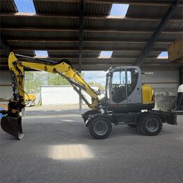 Колёсный экскаватор WACKER