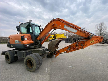 Колёсный экскаватор Doosan DX 55W: фото 5