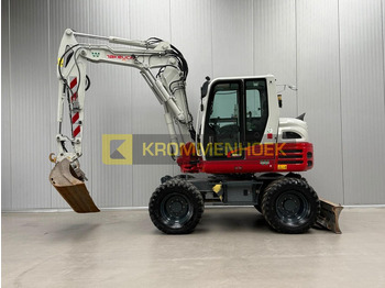 Колёсный экскаватор TAKEUCHI