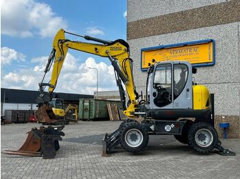 Колёсный экскаватор WACKER