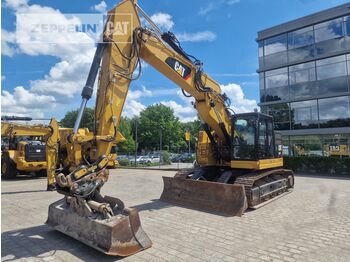 Гусеничный экскаватор CATERPILLAR
