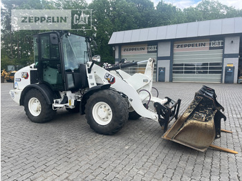 Колёсный погрузчик CATERPILLAR 906M