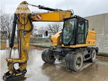 Колёсный экскаватор CATERPILLAR M318