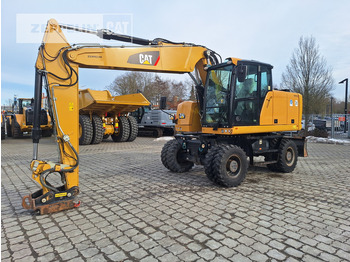 Колёсный экскаватор CATERPILLAR M318F