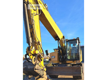 Колёсный экскаватор CATERPILLAR M318F