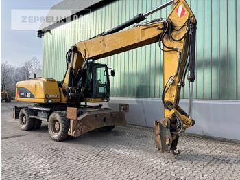 Колёсный экскаватор CATERPILLAR M322D