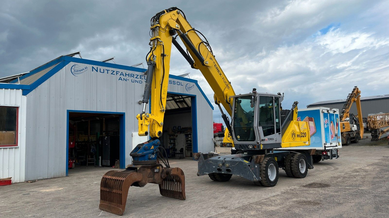 Fuchs TeRex MHL 320 D Umschlagbagger Greifer Pratzen - Перегружатель: фото 3 Fuchs TeRex MHL 320 D Umschlagbagger Greifer Pratzen - Перегружатель: фото 3