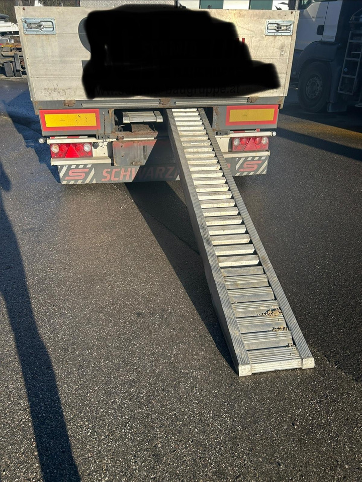 Schwarzmüller Pritsche mit Rampen T Serie T 202 - Прицеп бортовой/ Платформа: фото 2 Schwarzmüller Pritsche mit Rampen T Serie T 202 - Прицеп бортовой/ Платформа: фото 2