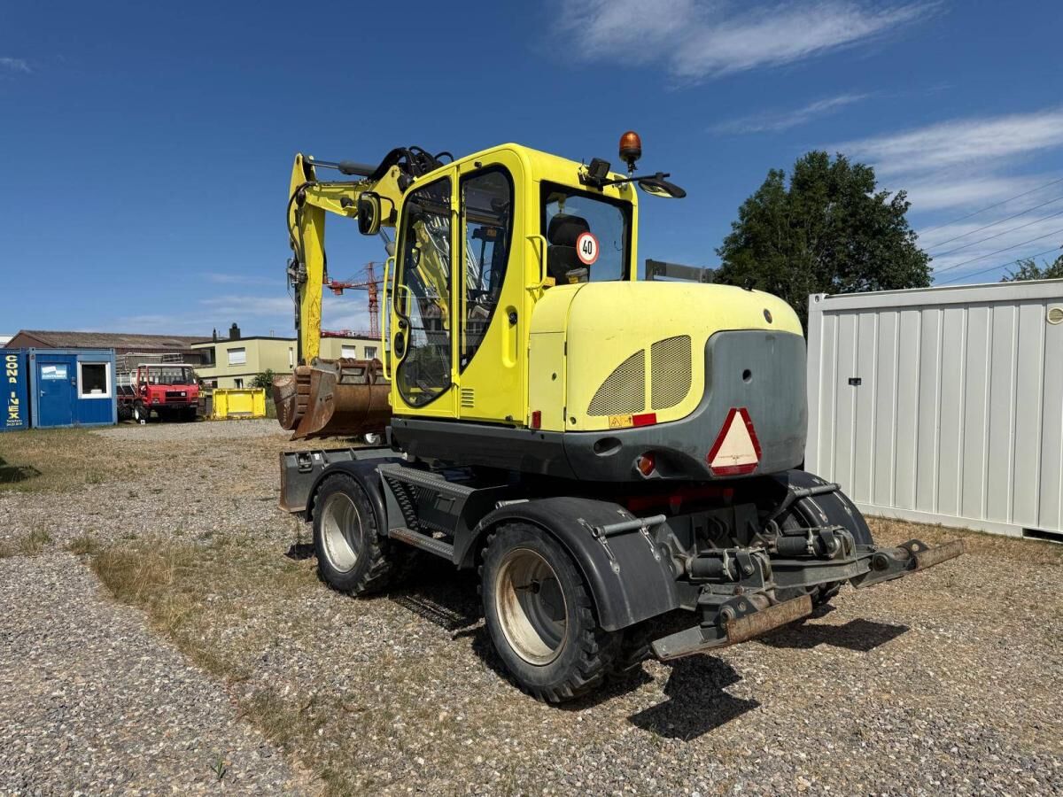 Wacker Neuson EW100 - Колёсный экскаватор: фото 1 Wacker Neuson EW100 - Колёсный экскаватор: фото 1