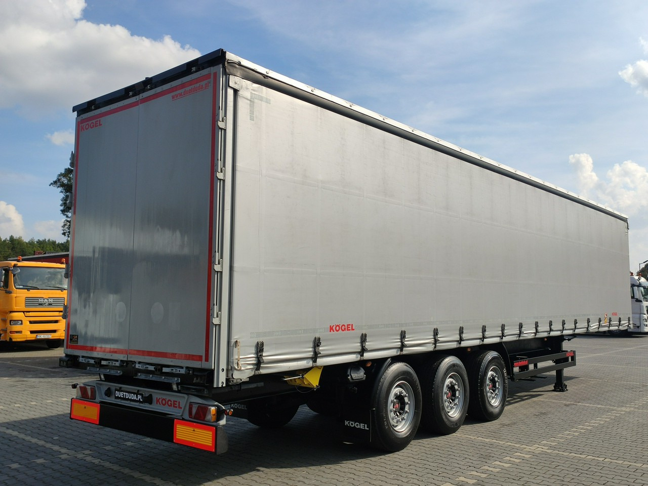 Тентованный полуприцеп Kogel Coil mulda 3 Osie SAF Dach i Boki Zsuwane: фото 7 Тентованный полуприцеп Kogel Coil mulda 3 Osie SAF Dach i Boki Zsuwane: фото 7