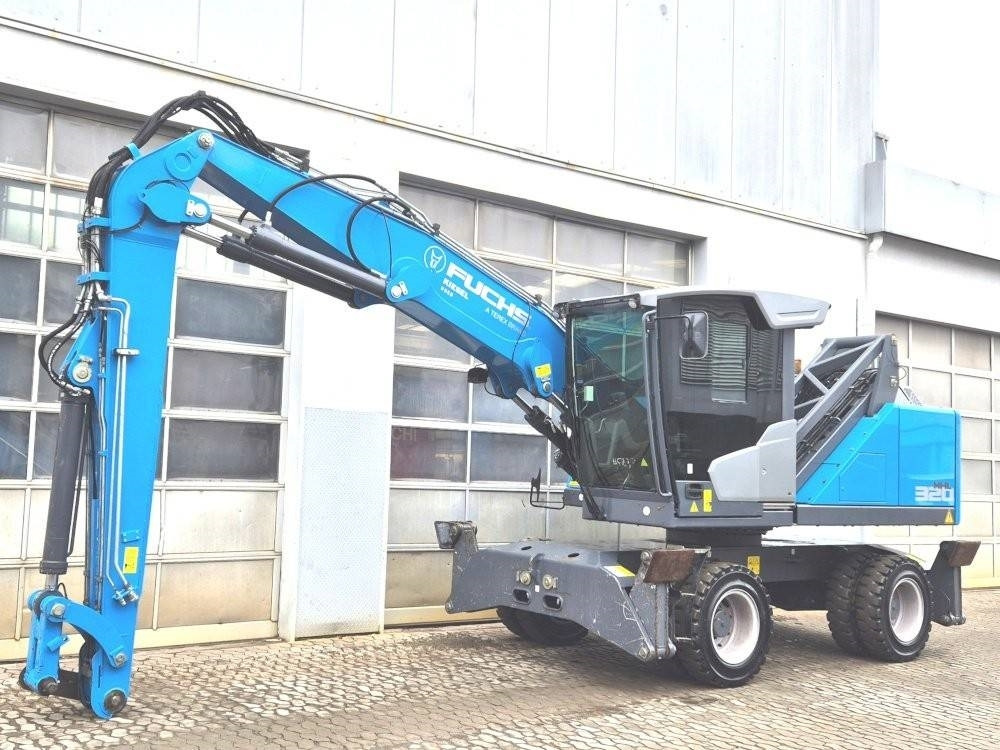 Fuchs MHL 320 F - Перегружатель: фото 2 Fuchs MHL 320 F - Перегружатель: фото 2