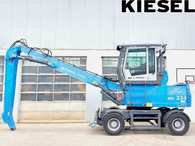 Fuchs MHL 334 D - Перегружатель: фото 1 Fuchs MHL 334 D - Перегружатель: фото 1