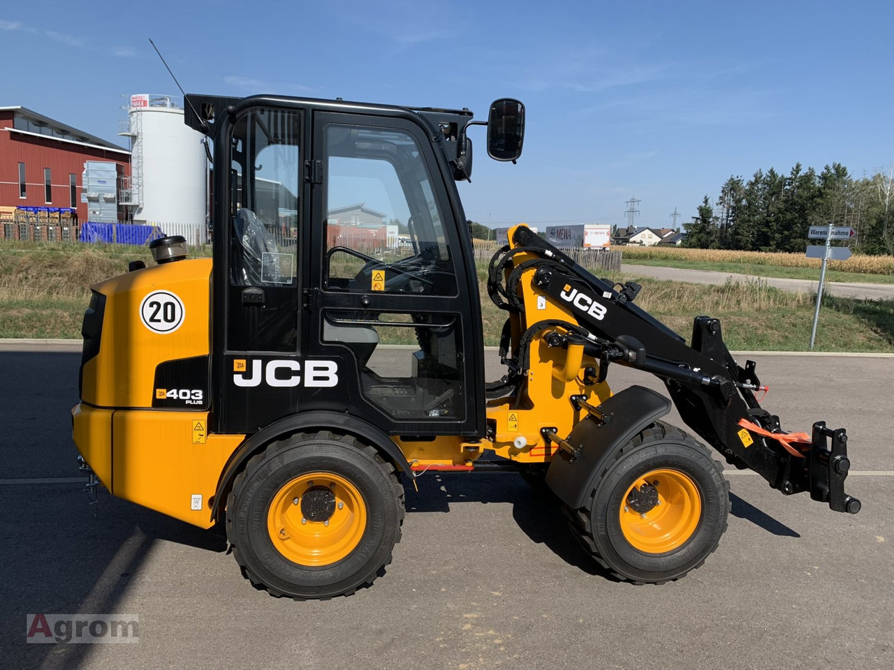 Новый Компактный фронтальный погрузчик JCB 403 Plus: фото 7