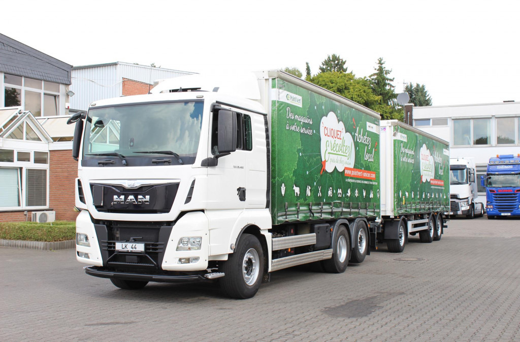 MAN TGX 26.480 Plane Stapleraufnahme Lenkachse Zug! - Тентованный грузовик: фото 1 MAN TGX 26.480 Plane Stapleraufnahme Lenkachse Zug! - Тентованный грузовик: фото 1