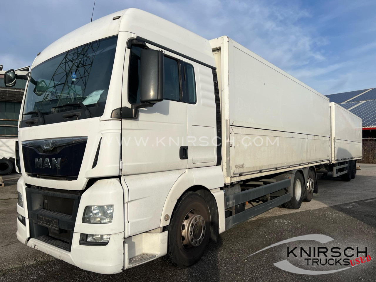 MAN TGA 26.480 Schwenkwandaufbau mit Böhm - Грузовик для перевозки напитков: фото 1 MAN TGA 26.480 Schwenkwandaufbau mit Böhm - Грузовик для перевозки напитков: фото 1