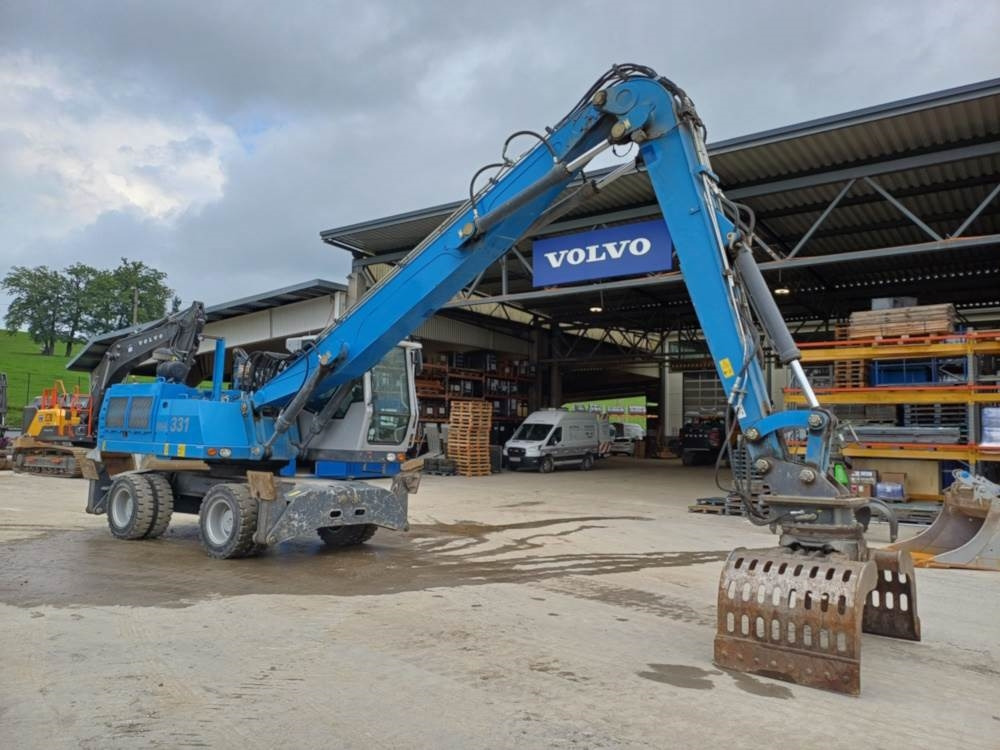 Fuchs MHL 331 - Перегружатель: фото 1 Fuchs MHL 331 - Перегружатель: фото 1