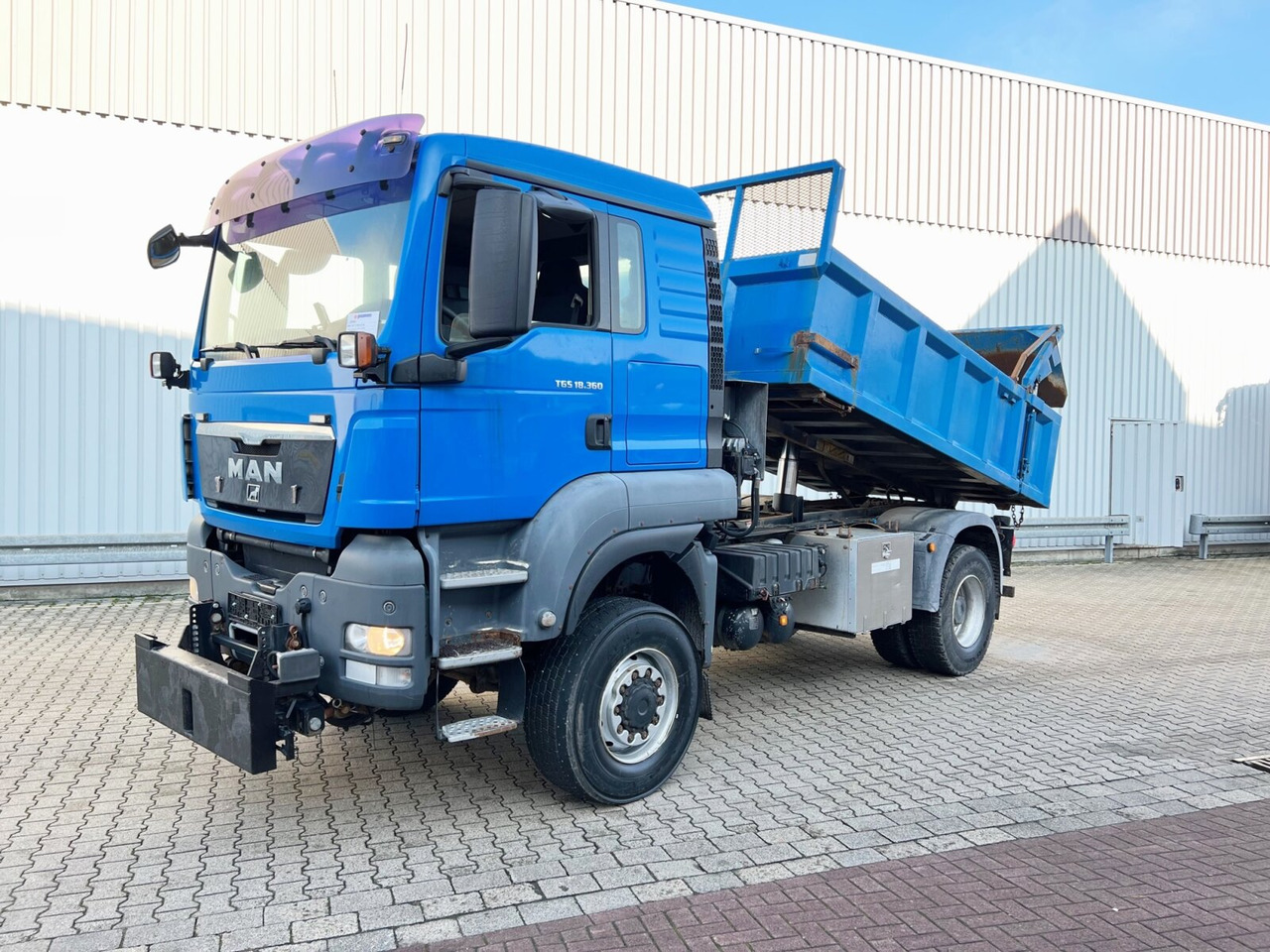 MAN TGS 18.360 4X4 BL TGS 18.360 4X4 BL, Hinterkipper, hydr. Heckklappe, Winterdienstausstattung - Самосвал: фото 1 MAN TGS 18.360 4X4 BL TGS 18.360 4X4 BL, Hinterkipper, hydr. Heckklappe, Winterdienstausstattung - Самосвал: фото 1