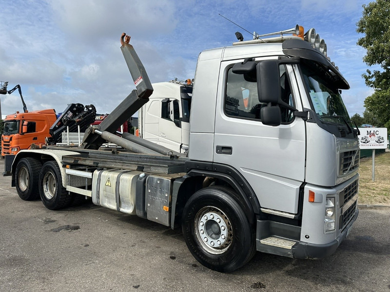 Volvo FM 400 6x4 HOOKLIFT / HAAKARM WAF 20T - EURO 5 - MANUAL - BLADVERING / STEEL SUSPENSION - TÜV 02/2026 - BE TRUCK - Крюковой мультилифт: фото 1 Volvo FM 400 6x4 HOOKLIFT / HAAKARM WAF 20T - EURO 5 - MANUAL - BLADVERING / STEEL SUSPENSION - TÜV 02/2026 - BE TRUCK - Крюковой мультилифт: фото 1