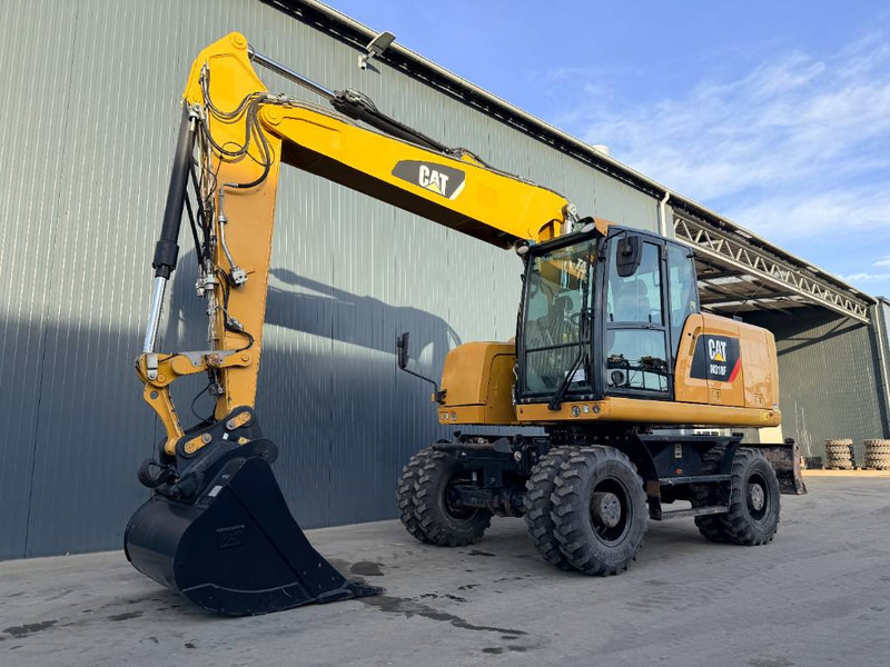 Cat M318F - Колёсный экскаватор: фото 1 Cat M318F - Колёсный экскаватор: фото 1