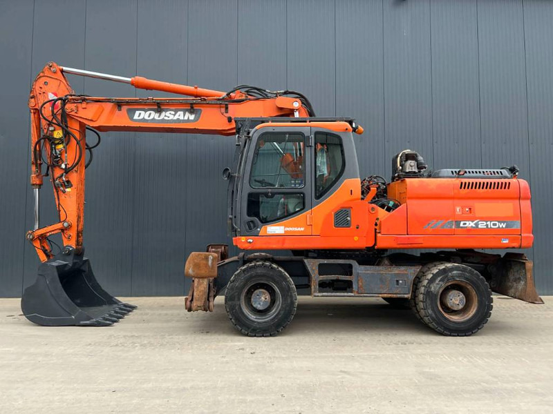 Doosan DX210W - Колёсный экскаватор: фото 5 Doosan DX210W - Колёсный экскаватор: фото 5