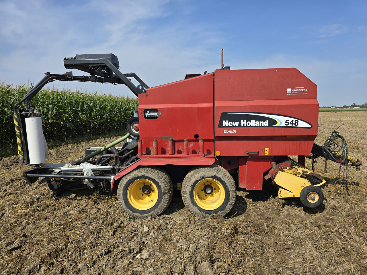 NEW HOLLAND 548 Combi - Пресс-подборщик рулонный: фото 1 NEW HOLLAND 548 Combi - Пресс-подборщик рулонный: фото 1