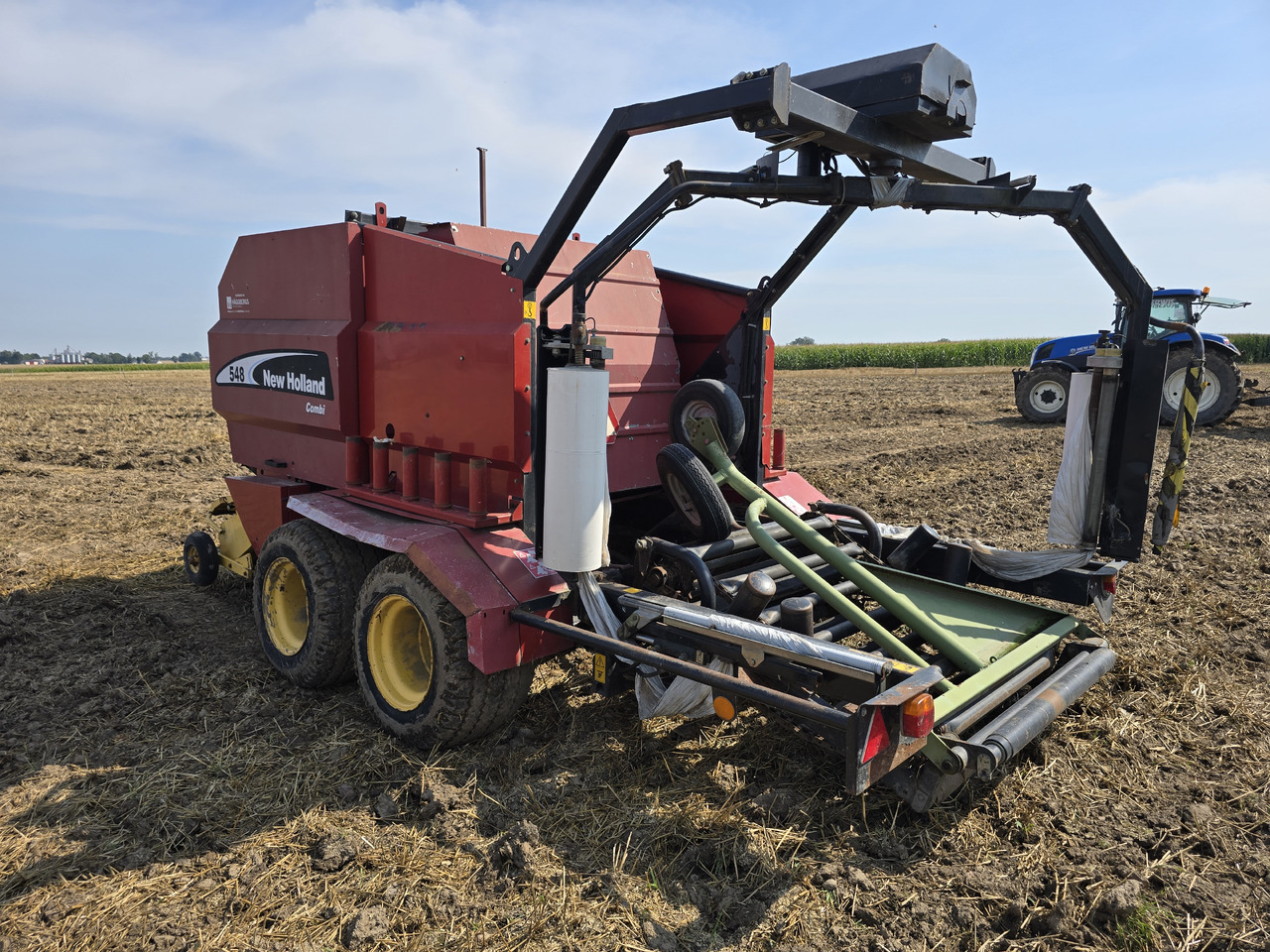 NEW HOLLAND 548 Combi - Пресс-подборщик рулонный: фото 5 NEW HOLLAND 548 Combi - Пресс-подборщик рулонный: фото 5