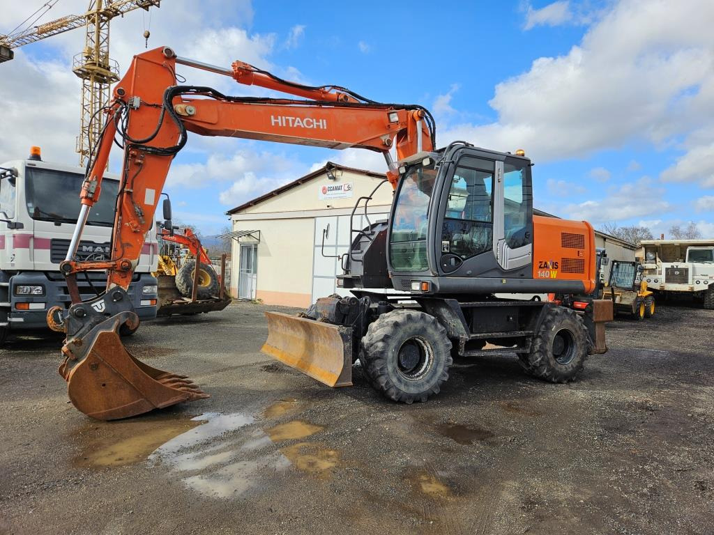 HITACHI ZX 140 W - Колёсный экскаватор: фото 1 HITACHI ZX 140 W - Колёсный экскаватор: фото 1