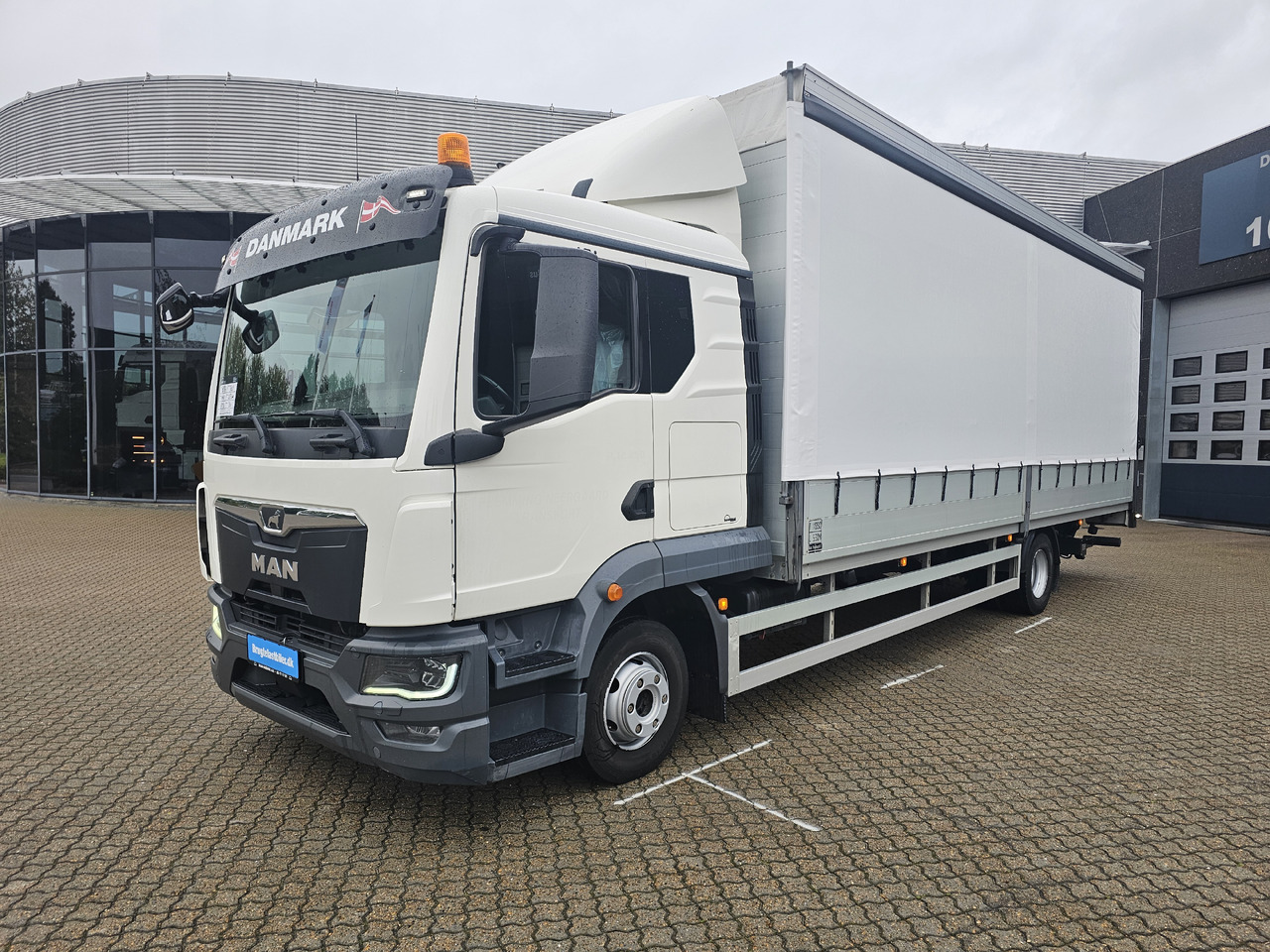 MAN TGL 12.250 - Тентованный грузовик: фото 1 MAN TGL 12.250 - Тентованный грузовик: фото 1