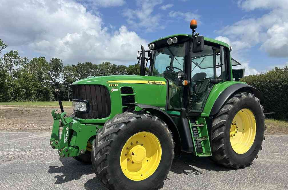 John Deere 6630 premium, tls, powerquad - Трактор: фото 1 John Deere 6630 premium, tls, powerquad - Трактор: фото 1