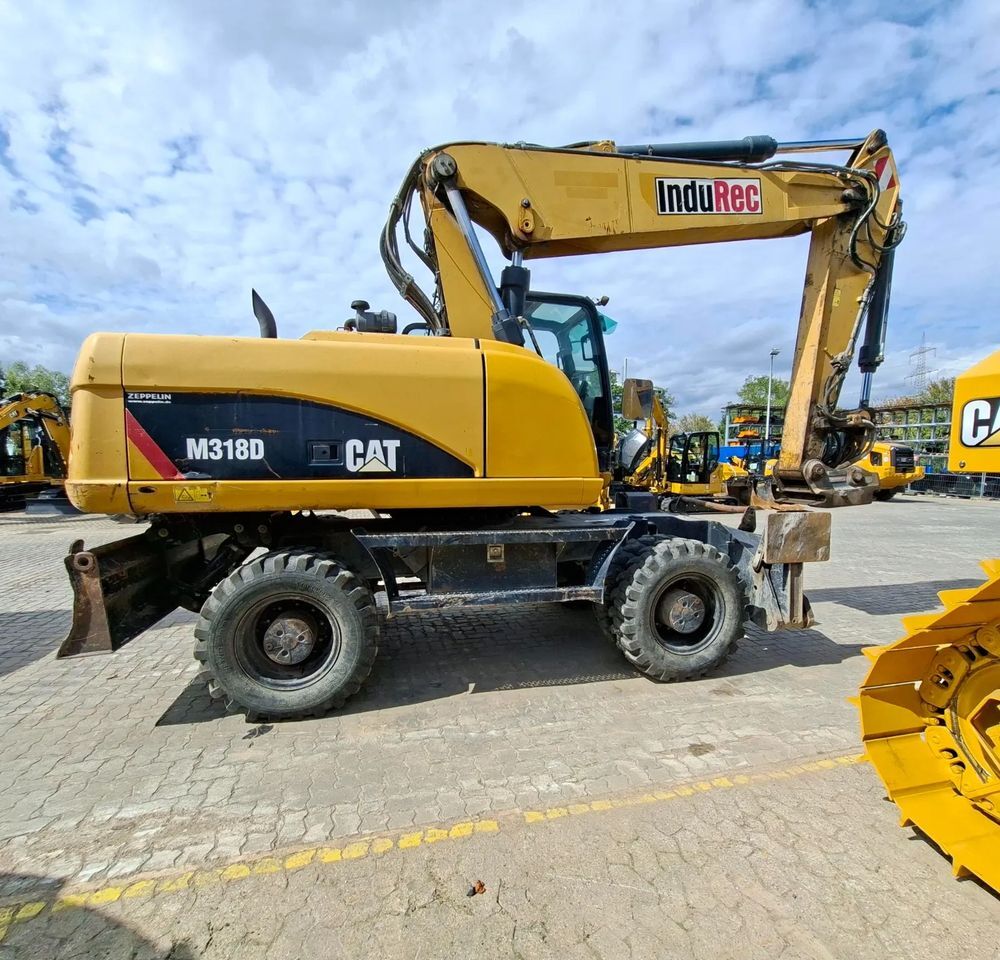 Caterpillar M318D, 2014 ROK, PODPORY + PŁUG - Колёсный экскаватор: фото 2 Caterpillar M318D, 2014 ROK, PODPORY + PŁUG - Колёсный экскаватор: фото 2