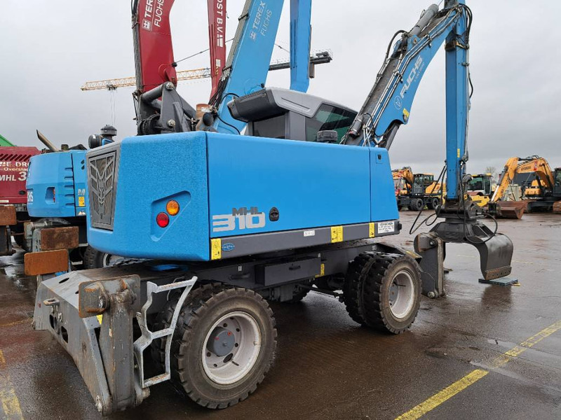 Fuchs MHL310F + Grapple - Перегружатель: фото 1 Fuchs MHL310F + Grapple - Перегружатель: фото 1