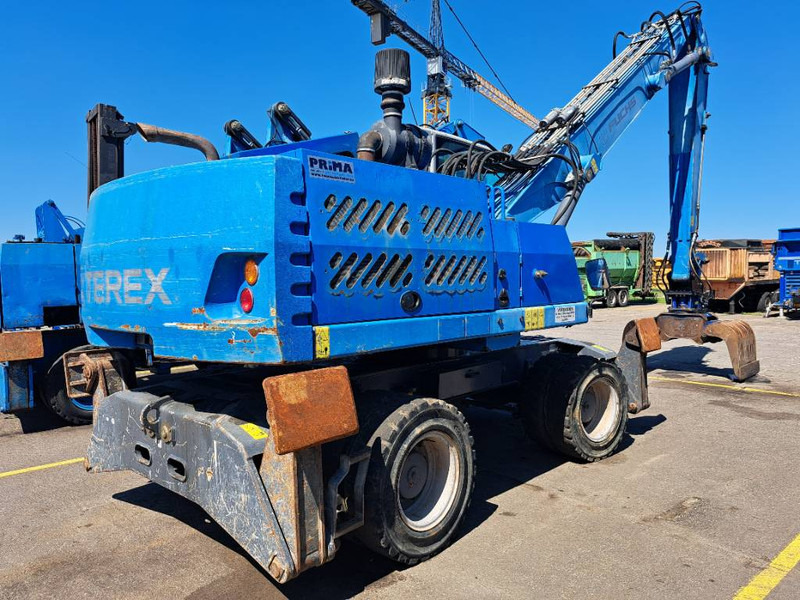 Fuchs MHL331E + Grapple - Перегружатель: фото 1 Fuchs MHL331E + Grapple - Перегружатель: фото 1