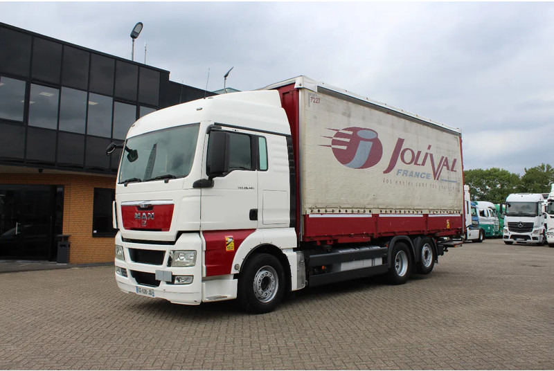 MAN TGX 26.440 * EURO5 * 6X2 * LIFT AXLE * - Тентованный грузовик: фото 1 MAN TGX 26.440 * EURO5 * 6X2 * LIFT AXLE * - Тентованный грузовик: фото 1