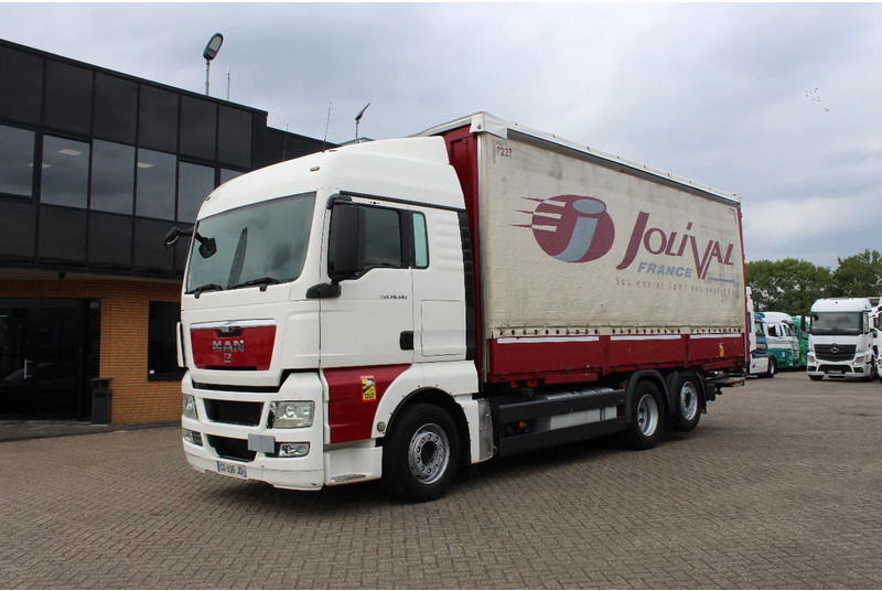 MAN TGX 26.440 * EURO5 * 6X2 * LIFT AXLE * - Тентованный грузовик: фото 2 MAN TGX 26.440 * EURO5 * 6X2 * LIFT AXLE * - Тентованный грузовик: фото 2