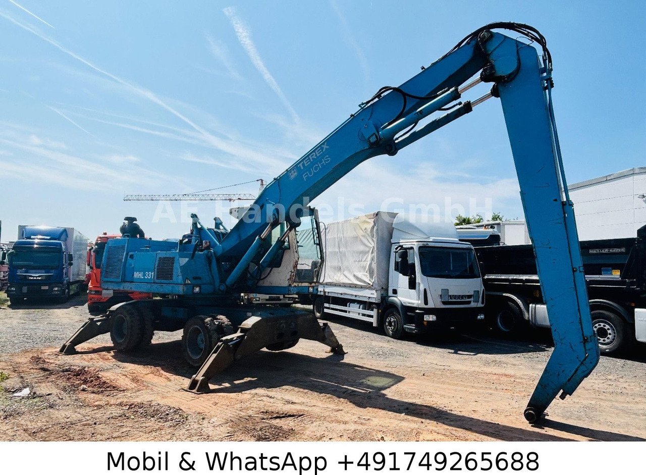 Terex MHL 331 Umschlagbagger - Колёсный экскаватор: фото 1 Terex MHL 331 Umschlagbagger - Колёсный экскаватор: фото 1