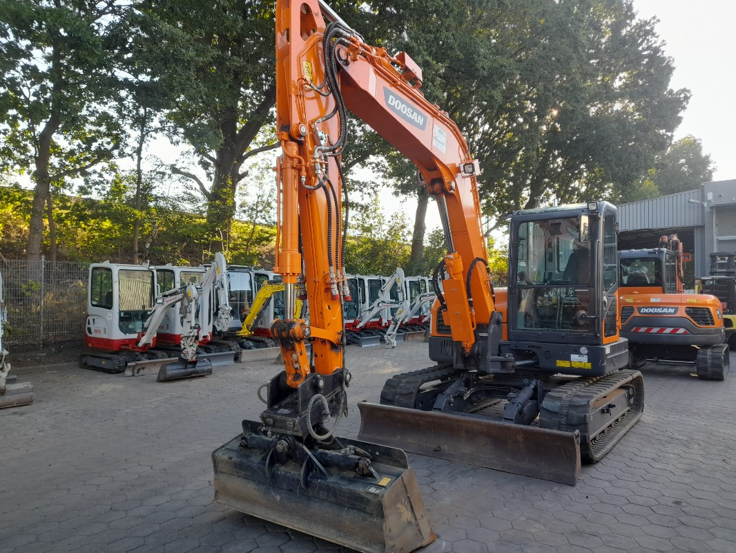 Doosan DX85R-3 - Гусеничный экскаватор: фото 1 Doosan DX85R-3 - Гусеничный экскаватор: фото 1