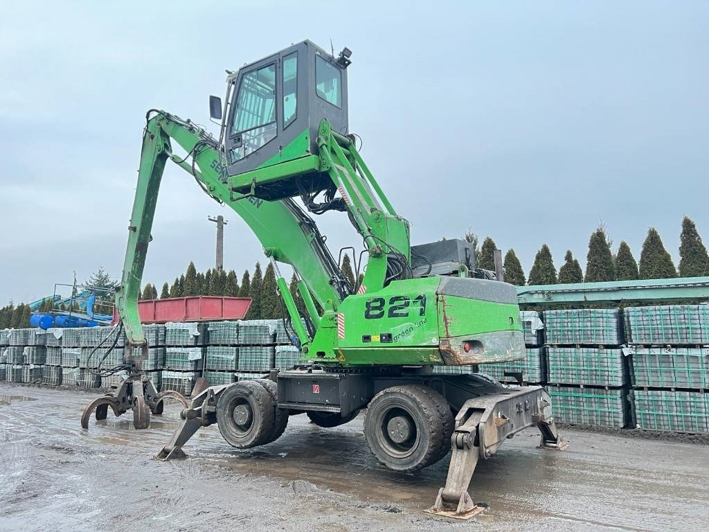 Sennebogen 821 - Перегружатель: фото 2 Sennebogen 821 - Перегружатель: фото 2