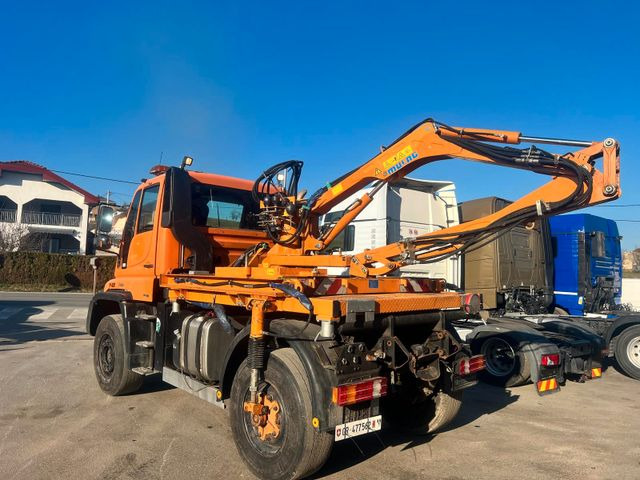 Unimog U500 4x4, Boeschungsmaehwerk Mulag - Грузовик: фото 1 Unimog U500 4x4, Boeschungsmaehwerk Mulag - Грузовик: фото 1