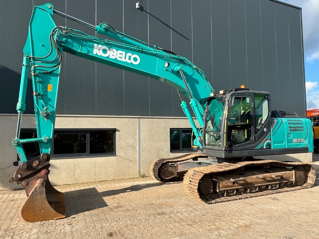 Kobelco SK 210 LC-10 - SK210 - SK210LC-10 - Гусеничный экскаватор: фото 1 Kobelco SK 210 LC-10 - SK210 - SK210LC-10 - Гусеничный экскаватор: фото 1