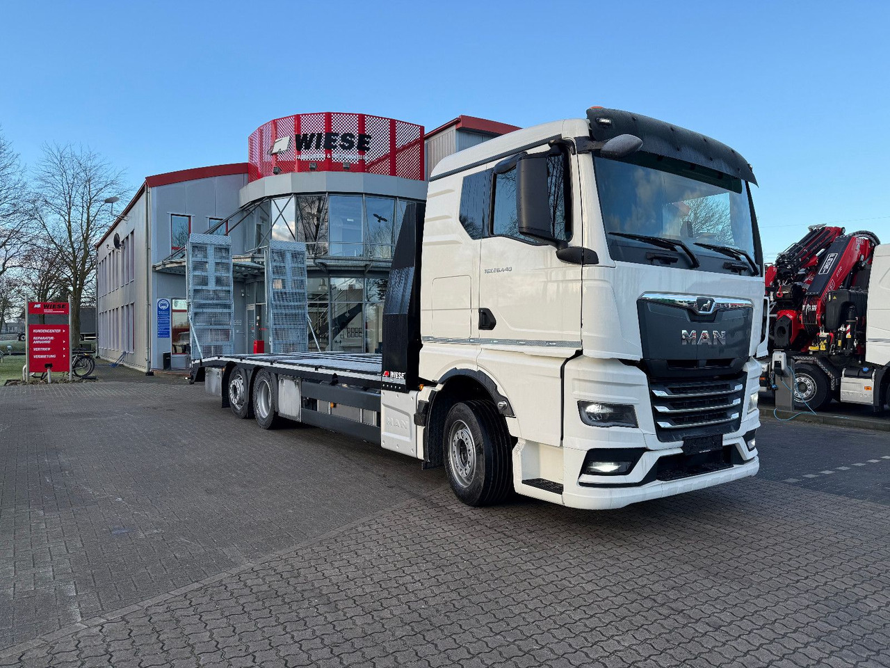 MAN Baumaschinen- Arbeitsbühnentransporter Rampen - Автовоз: фото 2 MAN Baumaschinen- Arbeitsbühnentransporter Rampen - Автовоз: фото 2