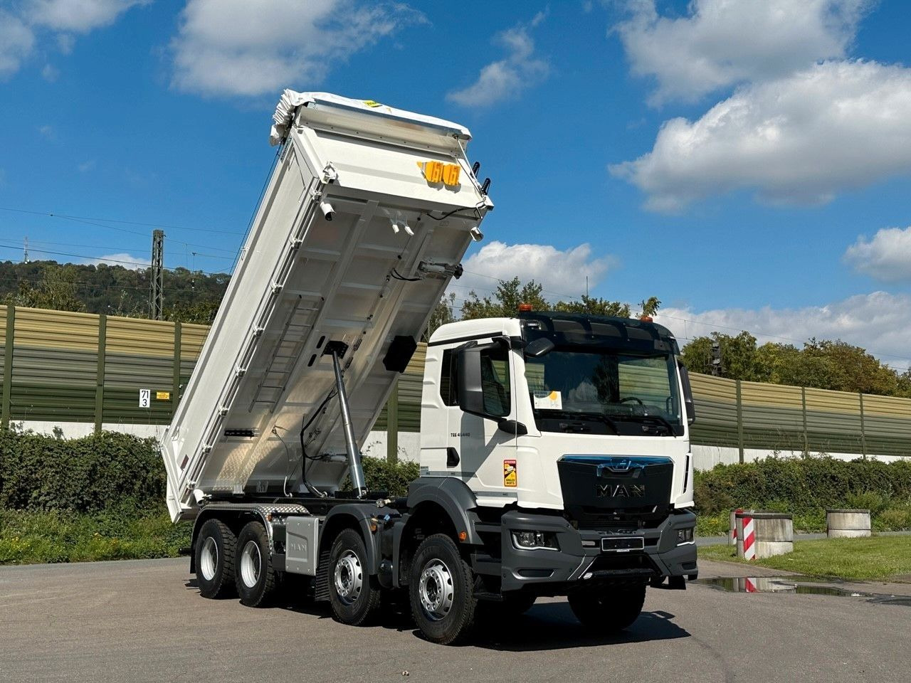 Самосвал MAN TGS 41.440  8x4 EuromixMTP 3-Seiten-Kipper: фото 13