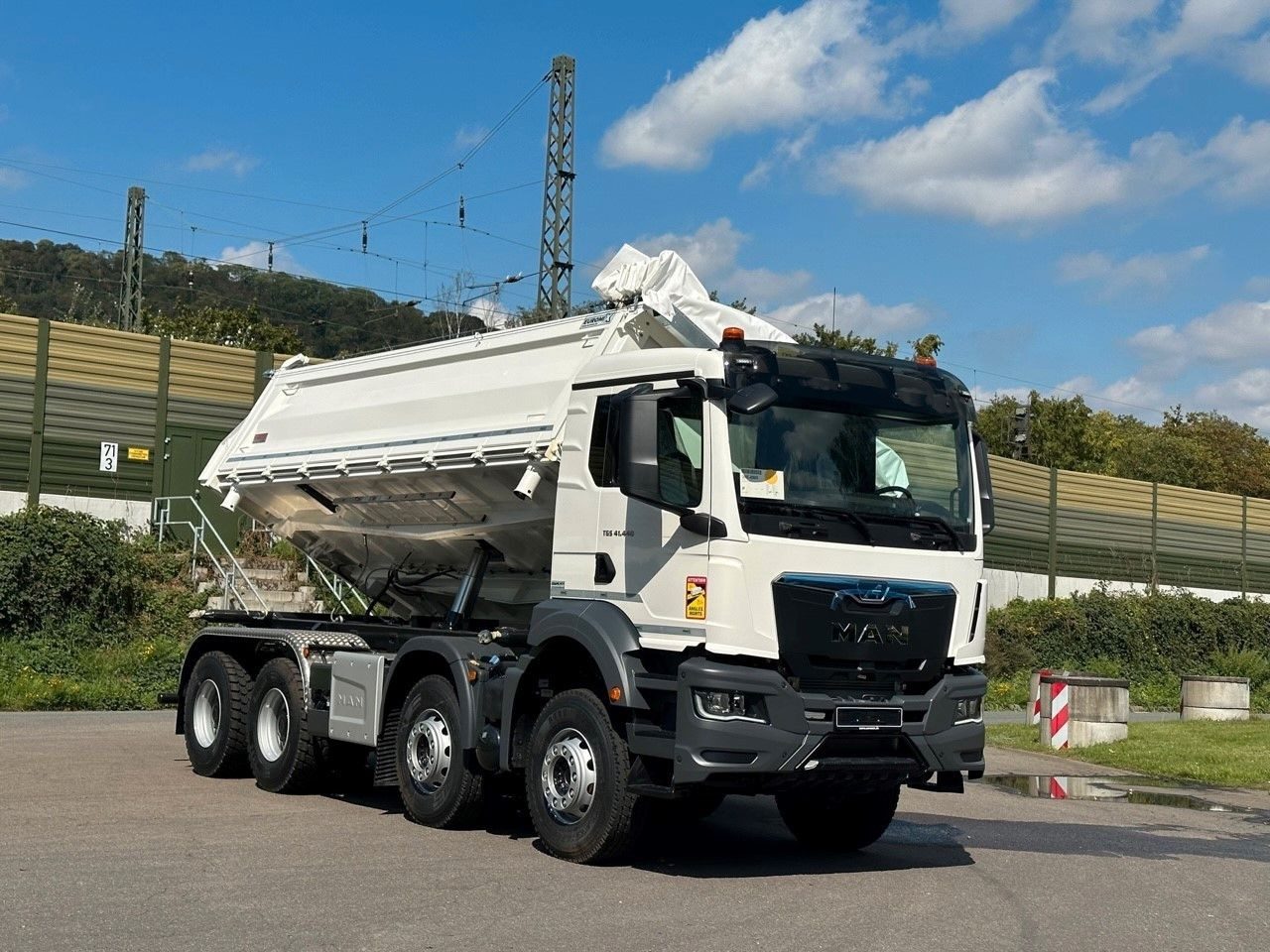 Самосвал MAN TGS 41.440  8x4 EuromixMTP 3-Seiten-Kipper: фото 18