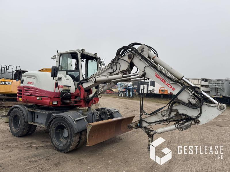 Takeuchi TB295W - Колёсный экскаватор: фото 4 Takeuchi TB295W - Колёсный экскаватор: фото 4