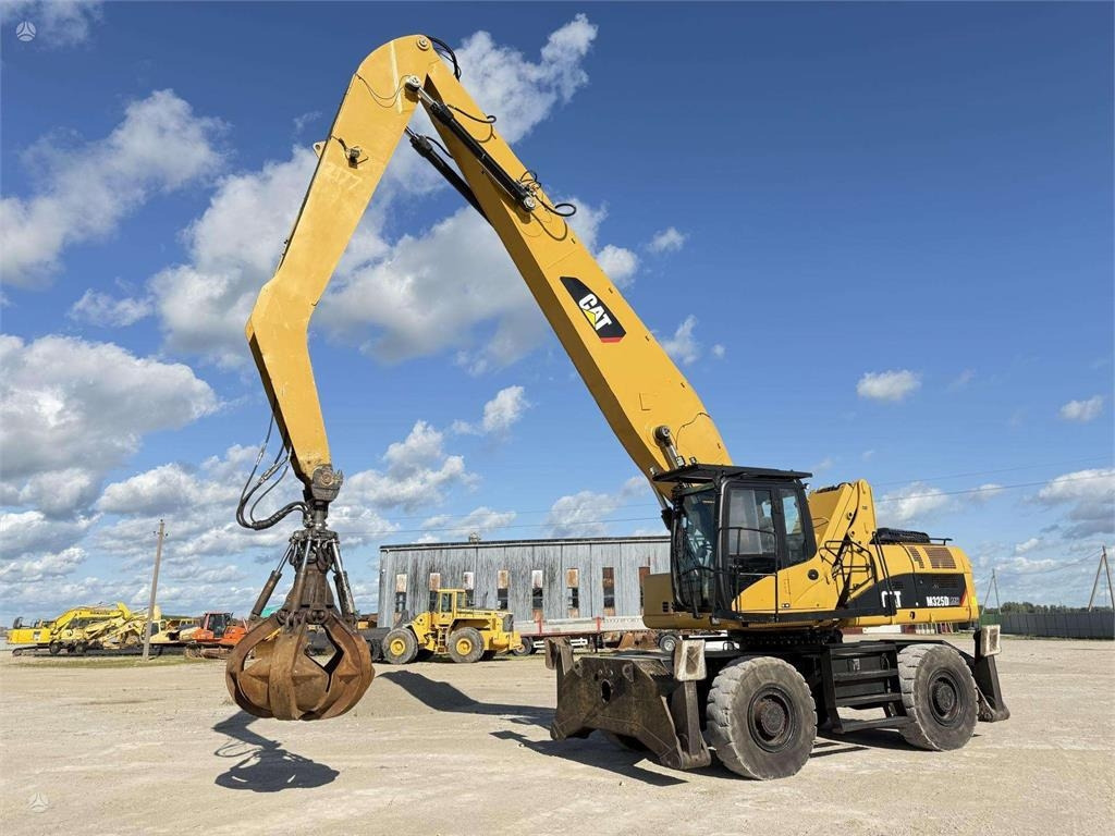 CAT M 325 DLMH - Колёсный экскаватор: фото 3 CAT M 325 DLMH - Колёсный экскаватор: фото 3