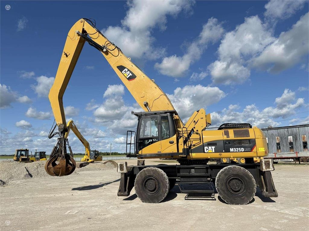 CAT M 325 DLMH - Колёсный экскаватор: фото 5 CAT M 325 DLMH - Колёсный экскаватор: фото 5